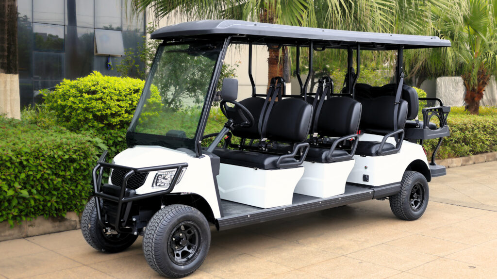 Fusion 6+2 electric passenger cart transporting eight passengers at an airport or large campus
