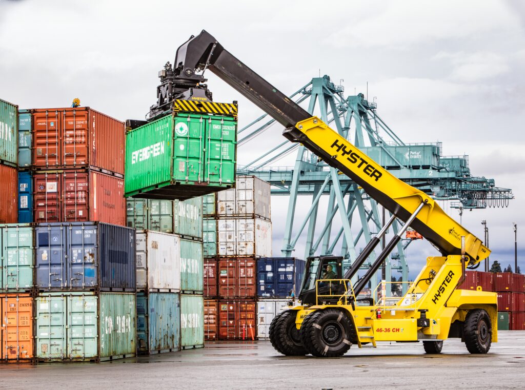 Container Handler outdoors lift, move, and stack shipping containers safely and efficiently