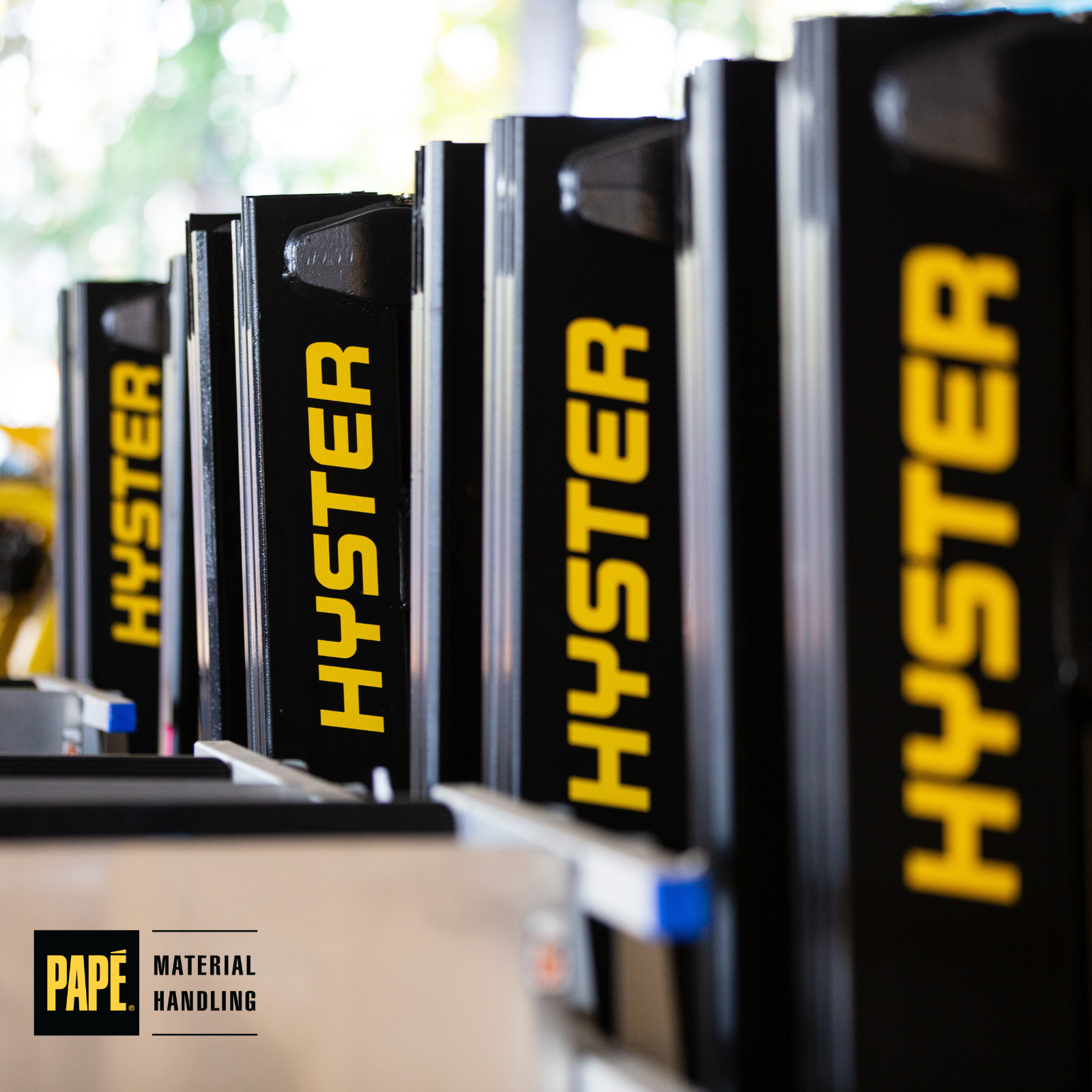 Hyster forklifts in a warehouse setting representing award-winning sales performance and recognition in the HYShare Rewards Grand Awards