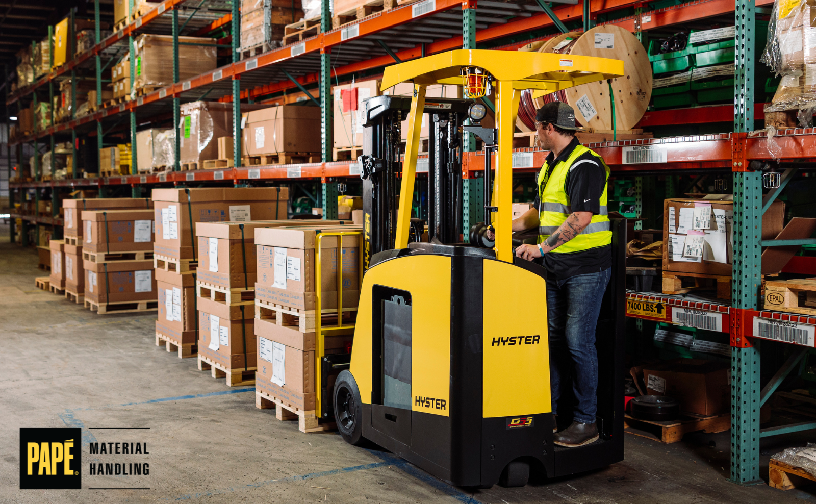 Forklifts operating in a busy warehouse as teams prepare equipment and fleet capacity for fall peak season