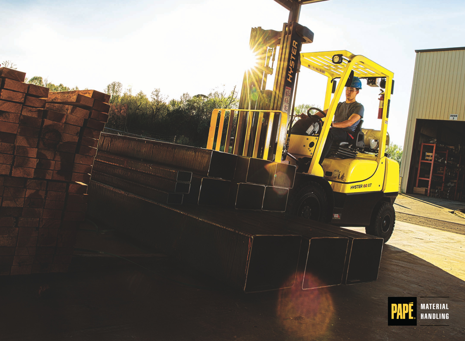 Heavy-duty Hyster forklift handling metal materials in an industrial metals facility