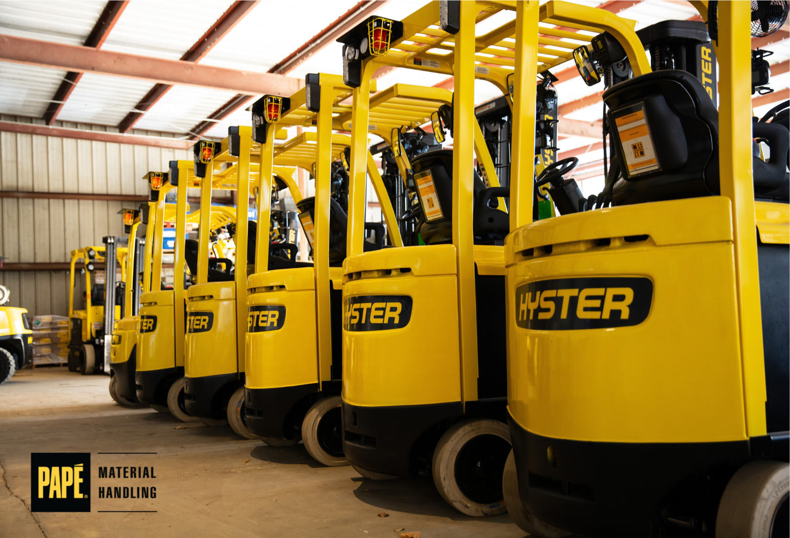 Hyster and Yale forklifts in a warehouse prepared for fall peak season with preventive maintenance and fleet support