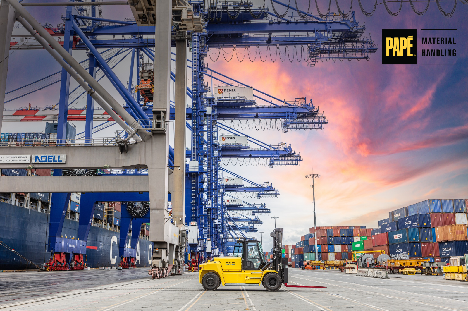 Yellow Hyster forklift positioned at a busy shipping port surrounded by cargo containers, container ships, and large gantry cranes.